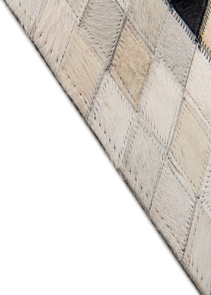 5' 1 x 7' 10 Cowhide Stocks Rug
