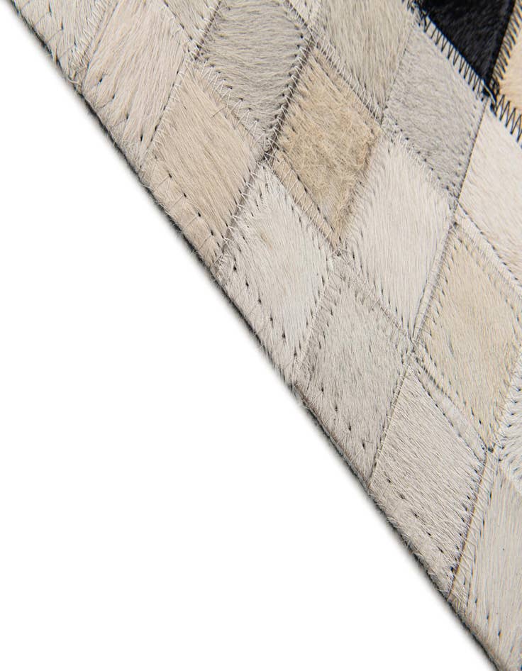 Detail image of 5' 1 x 7' 10 Cowhide Stocks Rug