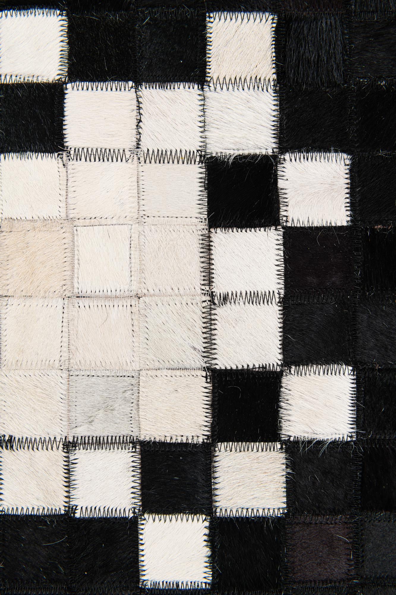 5' 1 x 7' 10 Cowhide Stocks Rug