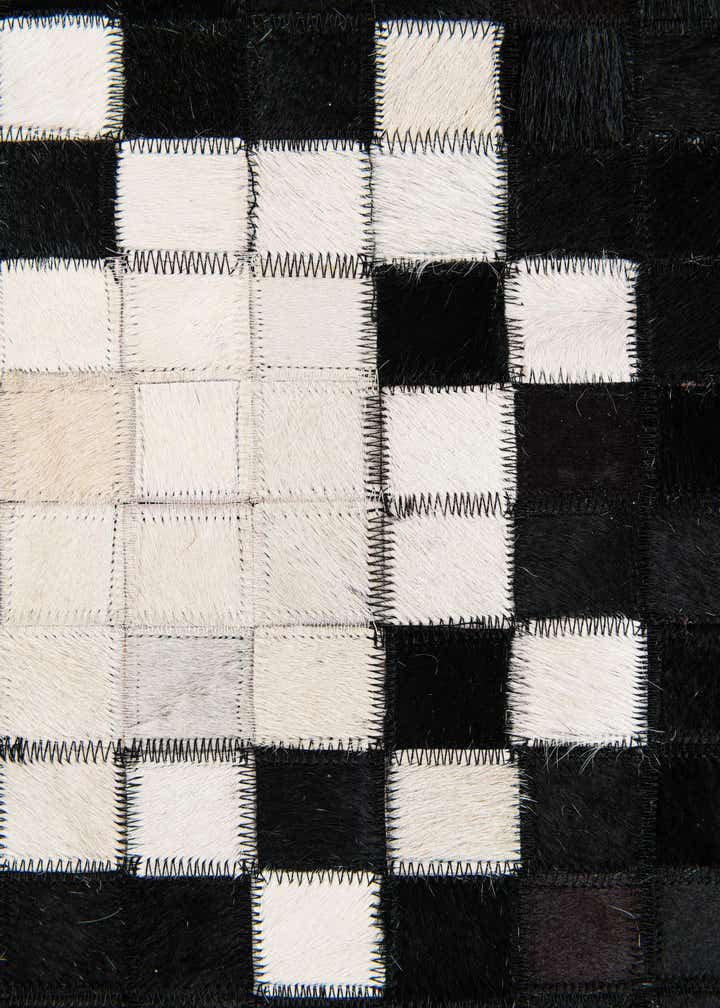 5' 1 x 7' 10 Cowhide Stocks Rug