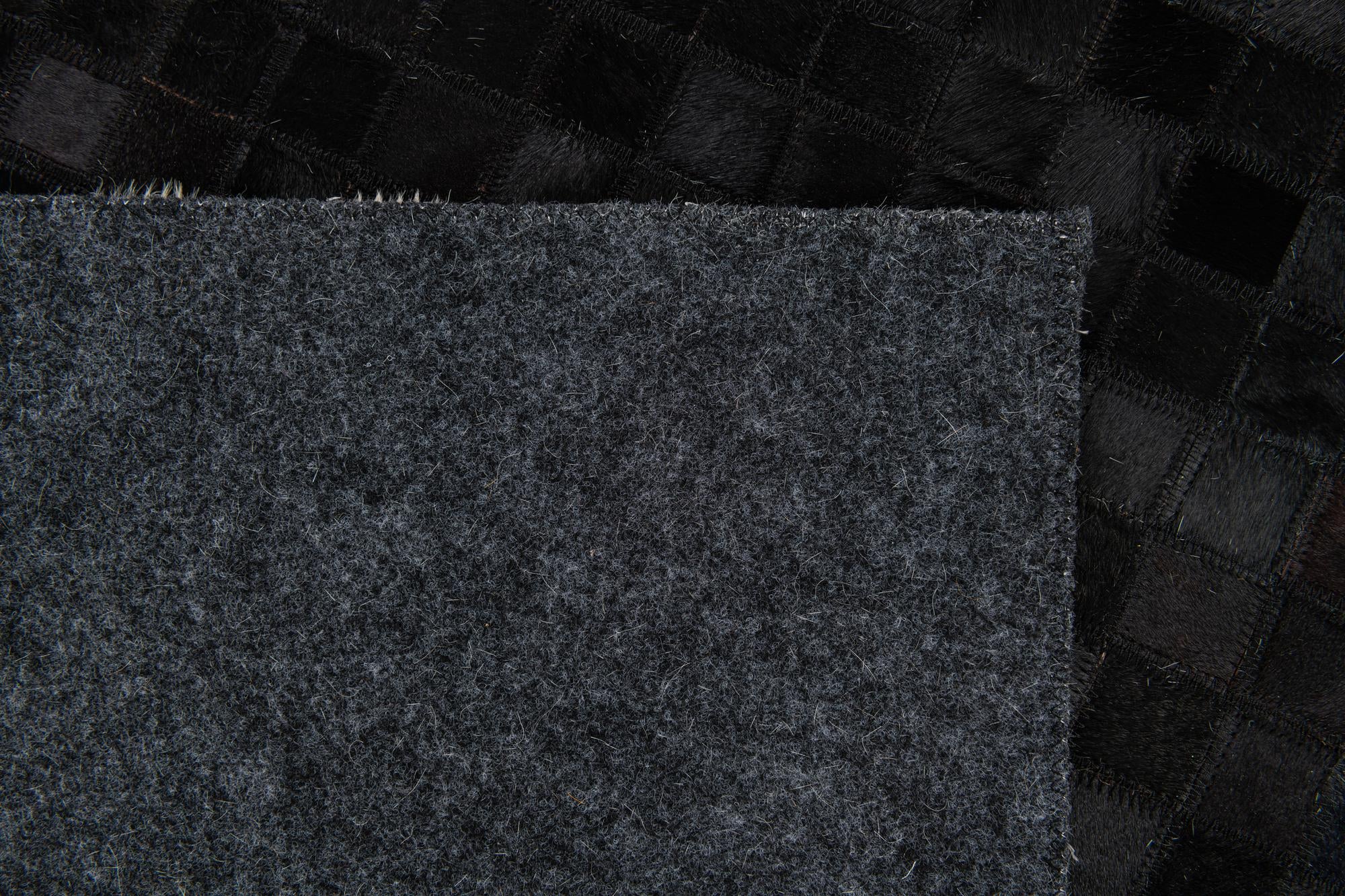 5' 1 x 7' 10 Cowhide Stocks Rug