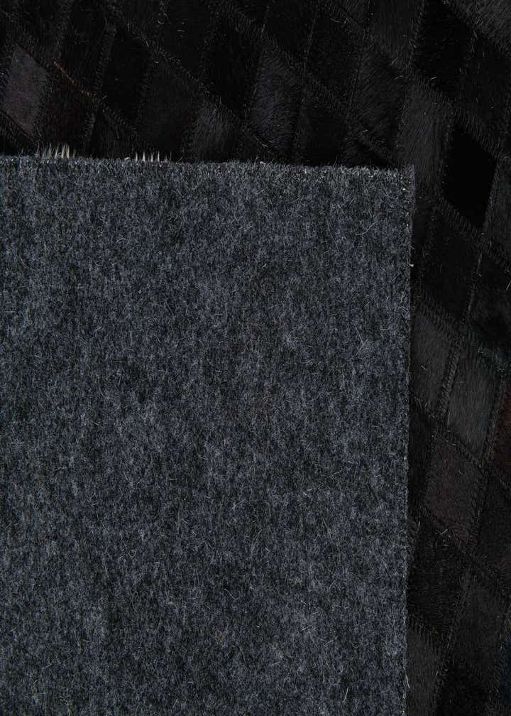 5' 1 x 7' 10 Cowhide Stocks Rug
