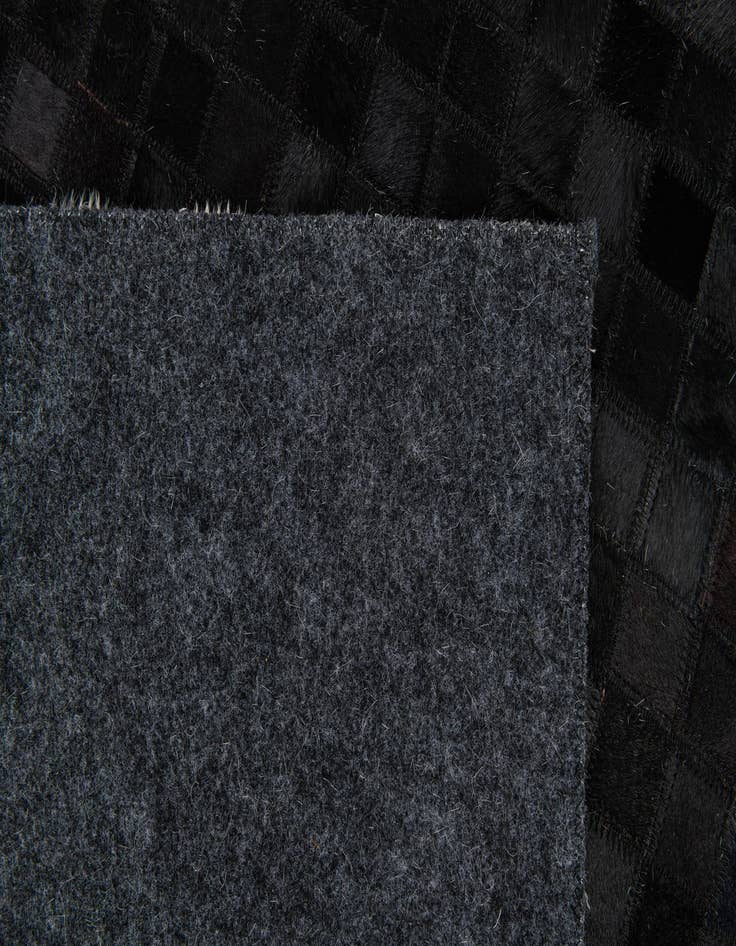 Detail image of 5' 1 x 7' 10 Cowhide Stocks Rug