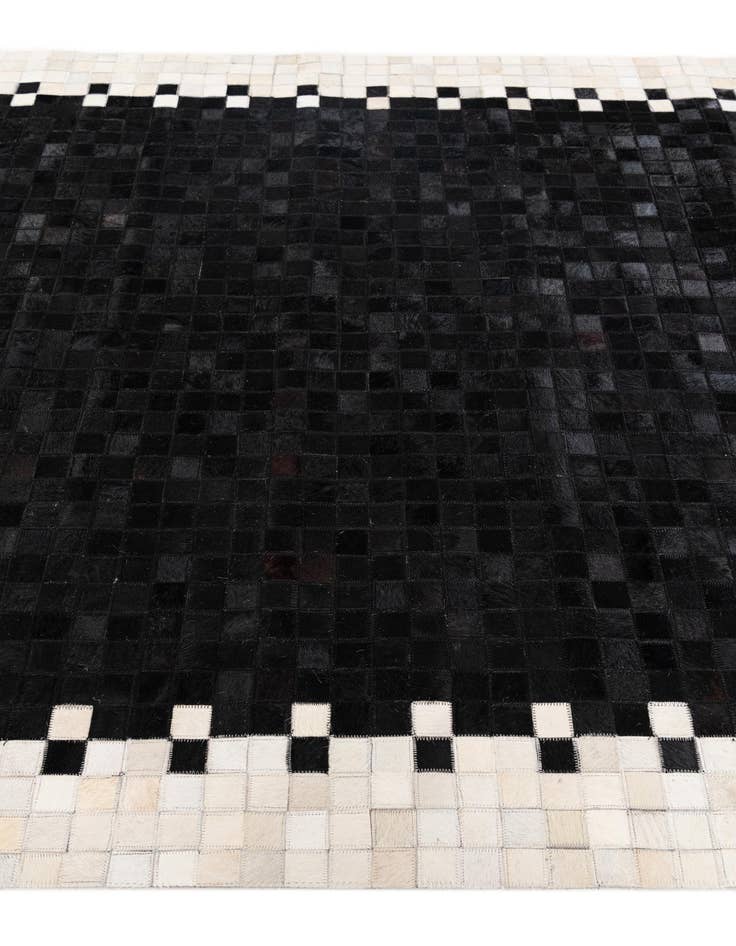 Detail image of 5' x 7' 9 Cowhide Stocks Rug