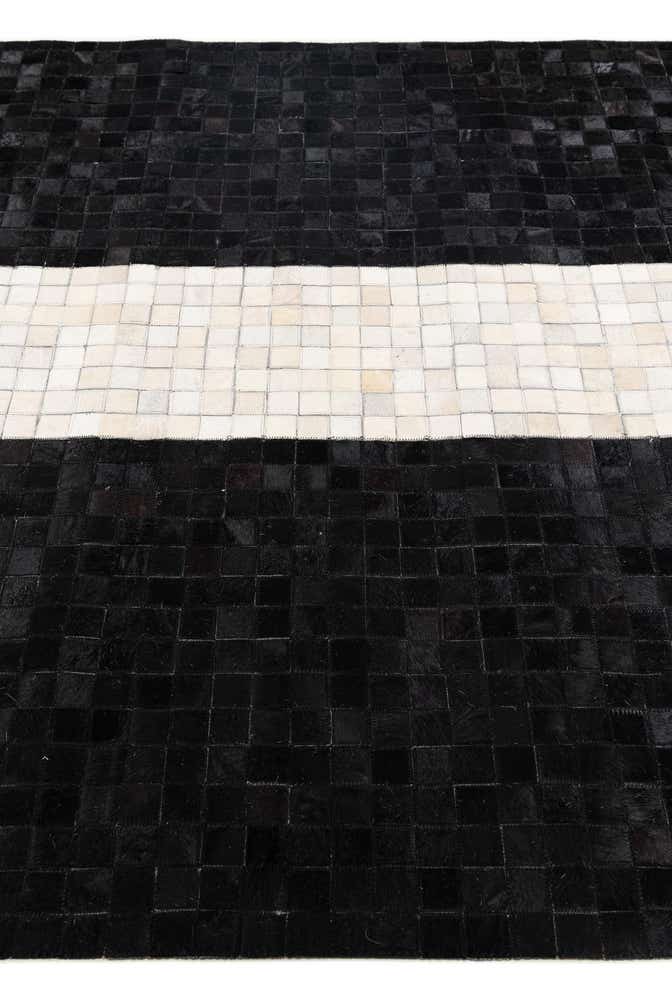 4' 11 x 7' 10 Cowhide Stocks Rug