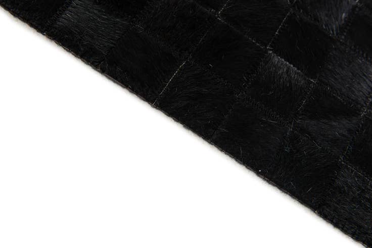 Detail image of 4' 11 x 7' 10 Cowhide Stocks Rug