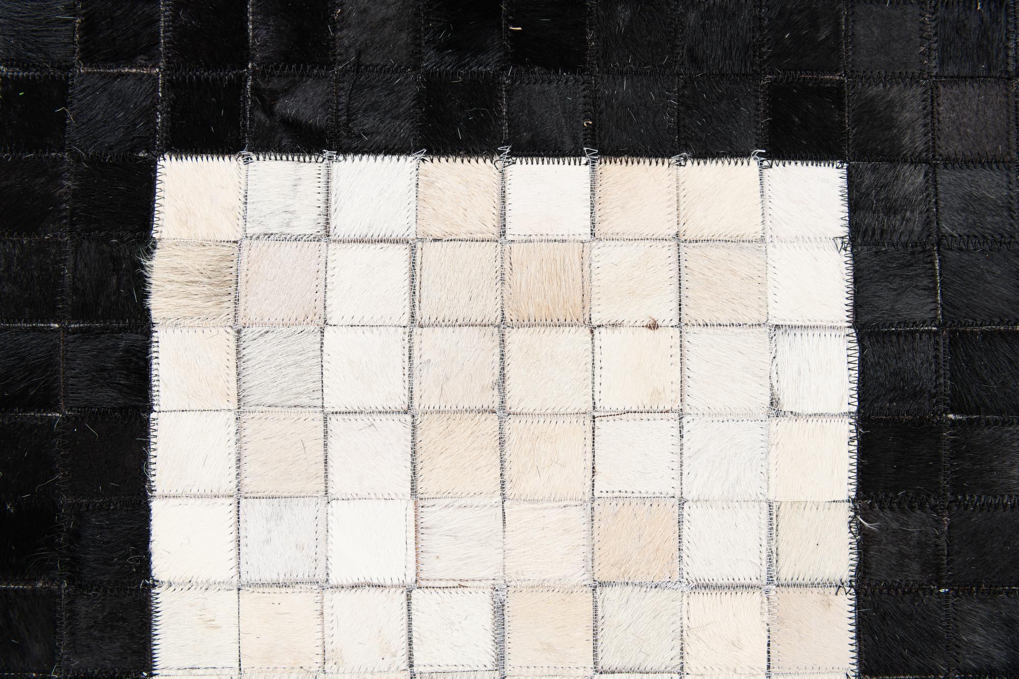 4' 11 x 7' 10 Cowhide Stocks Rug