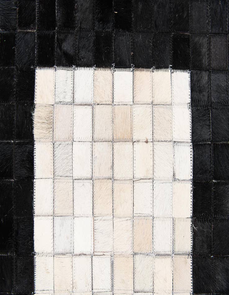 Detail image of 4' 11 x 7' 10 Cowhide Stocks Rug