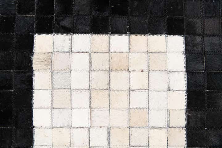 4' 11 x 7' 10 Cowhide Stocks Rug