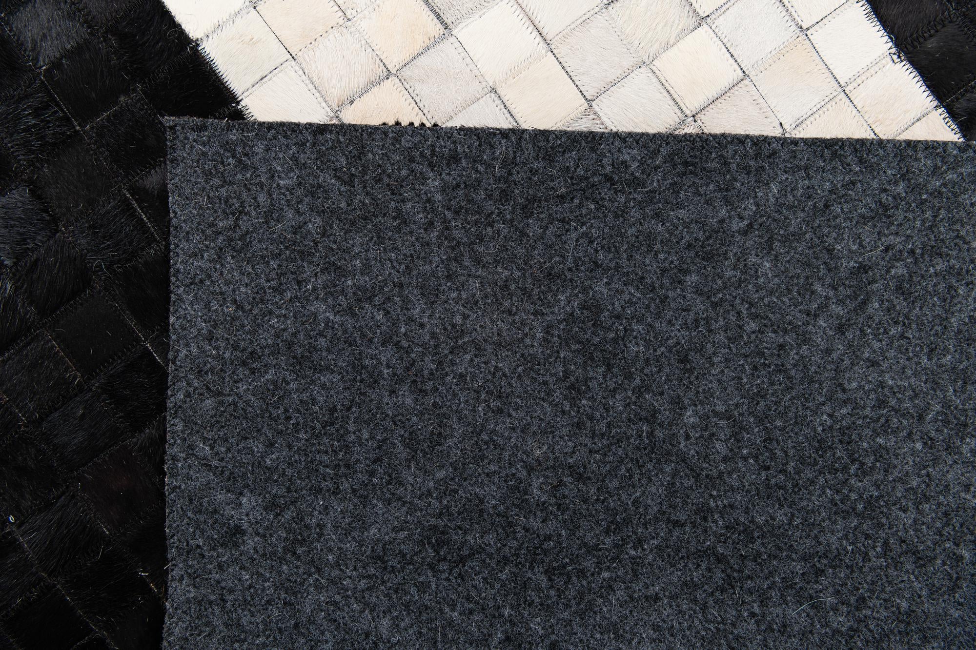 4' 11 x 7' 10 Cowhide Stocks Rug