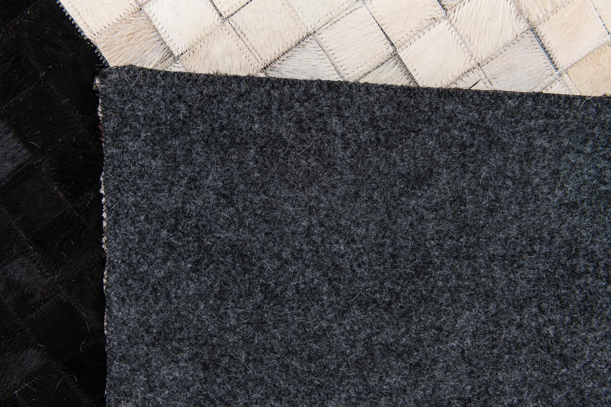 5' x 8' Cowhide Stocks Rug