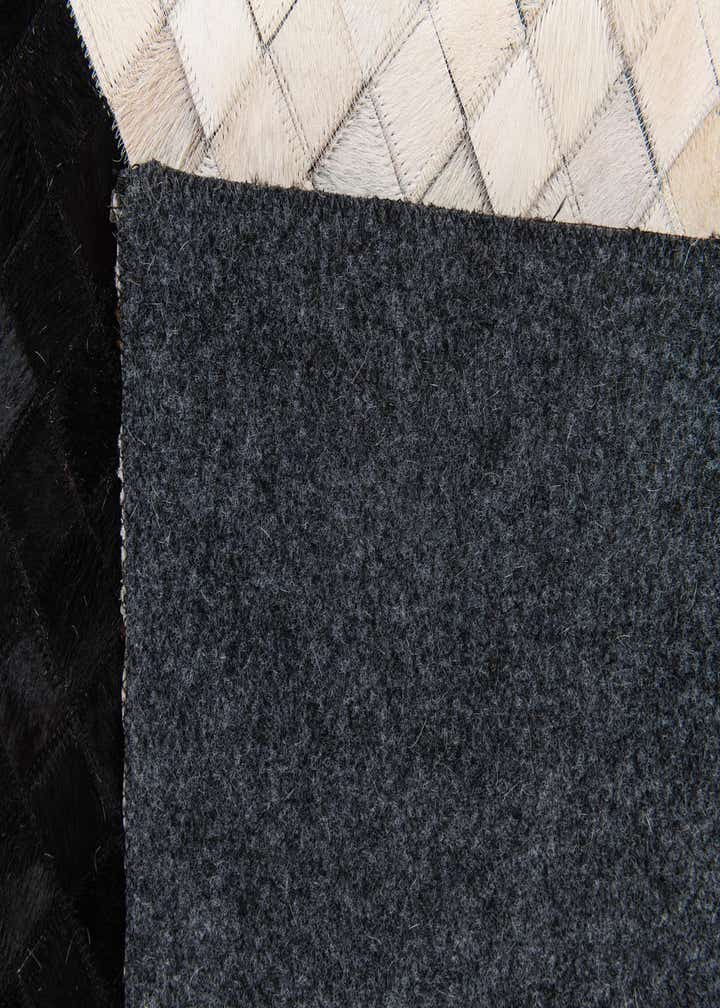 5' x 8' Cowhide Stocks Rug