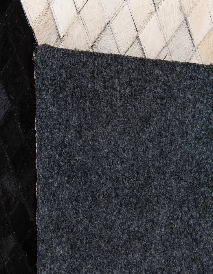 Detail image of 5' x 8' Cowhide Stocks Rug