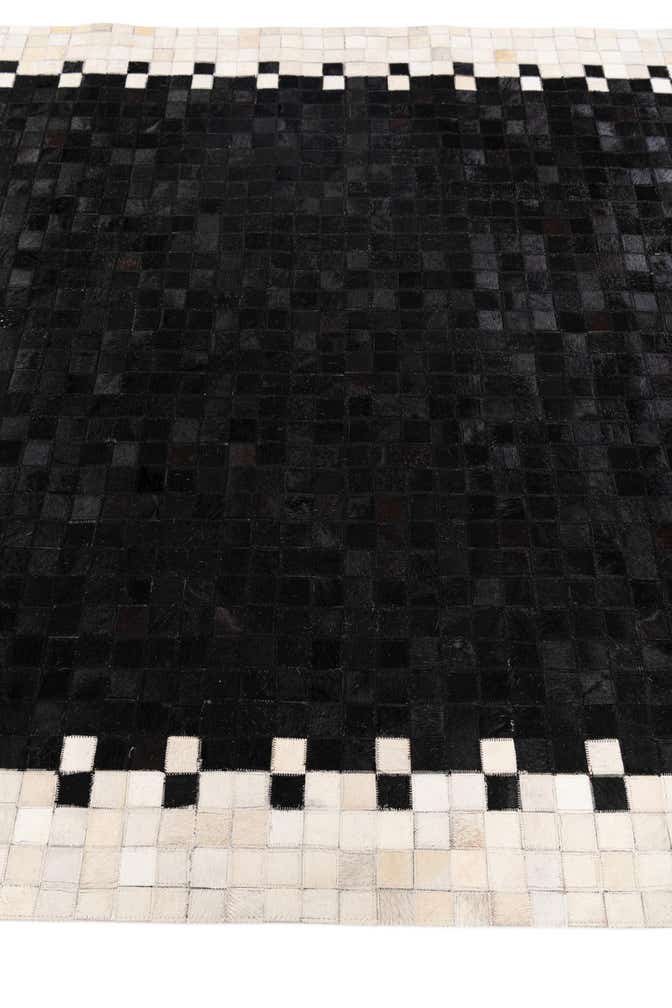 4' 11 x 7' 10 Cowhide Stocks Rug