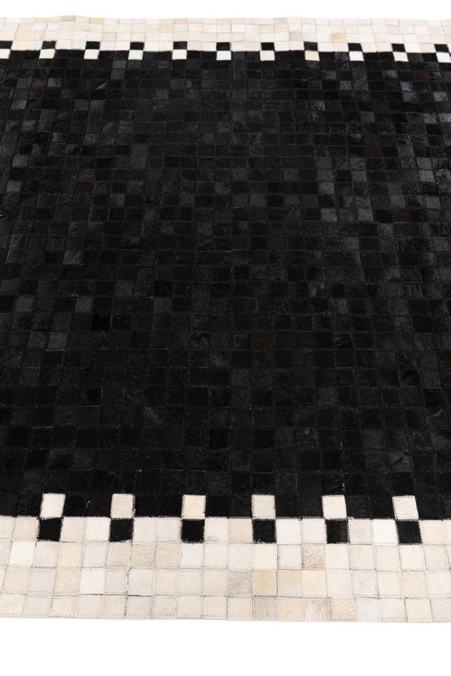Detail image of 4' 11 x 7' 10 Cowhide Stocks Rug