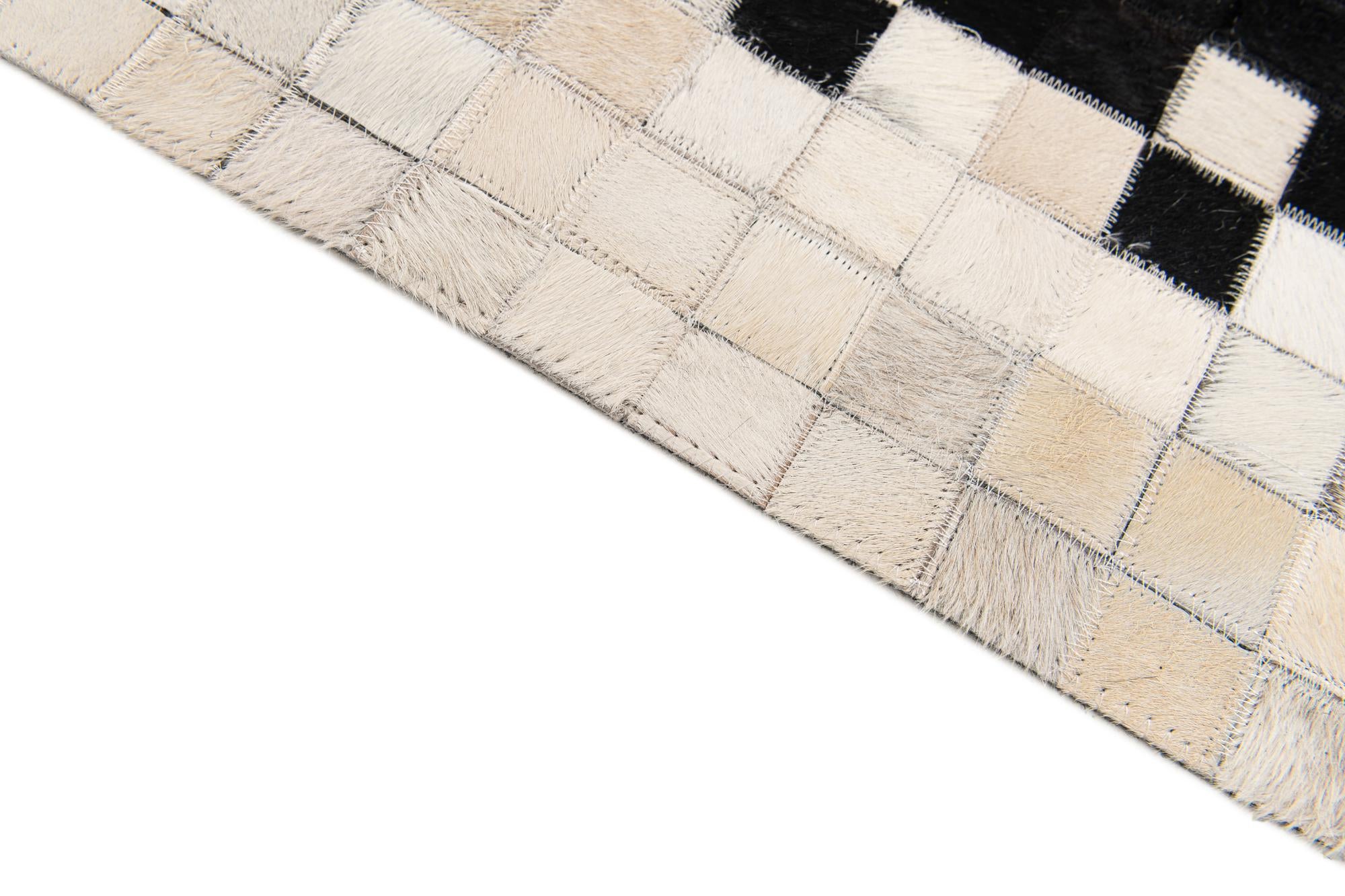4' 11 x 7' 10 Cowhide Stocks Rug