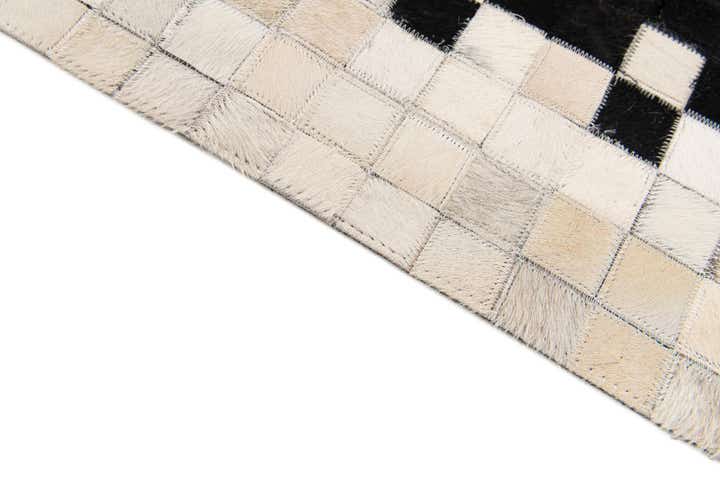 4' 11 x 7' 10 Cowhide Stocks Rug
