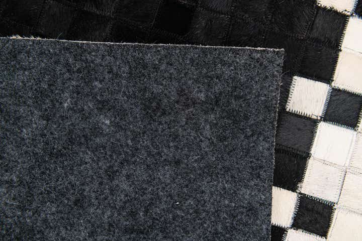 4' 11 x 7' 10 Cowhide Stocks Rug