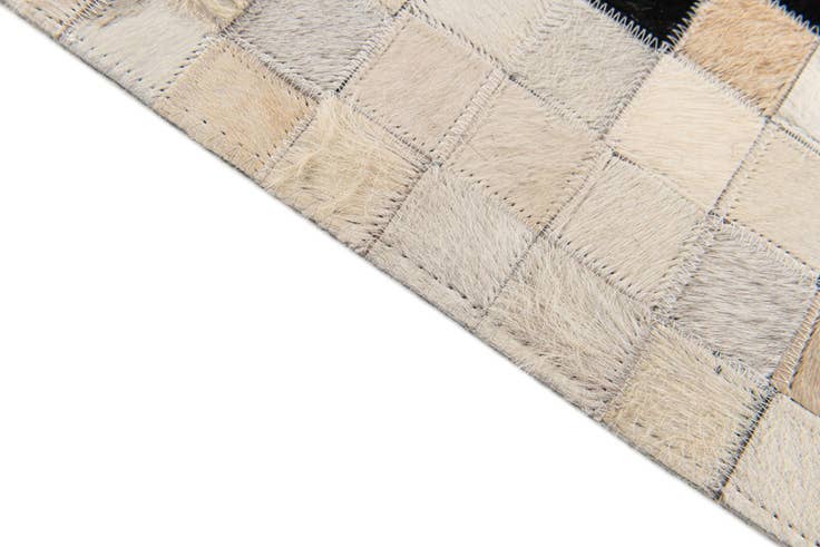 Detail image of 4' 10 x 7' 9 Cowhide Stocks Rug