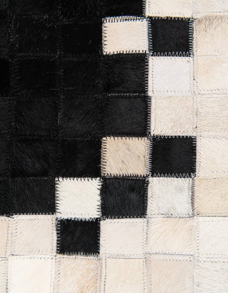 Detail image of 4' 10 x 7' 9 Cowhide Stocks Rug