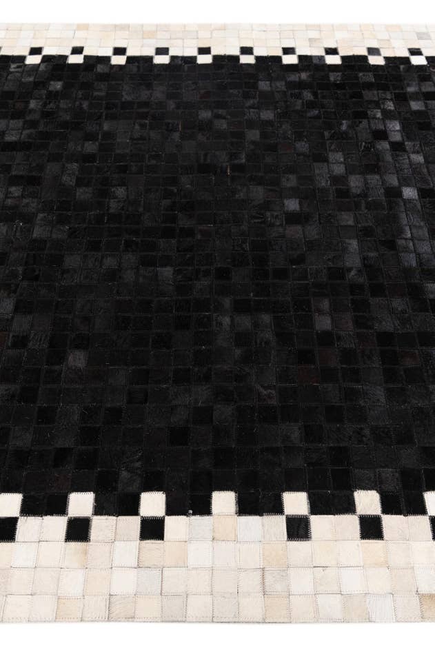 Detail image of 5' x 7' 10 Cowhide Stocks Rug