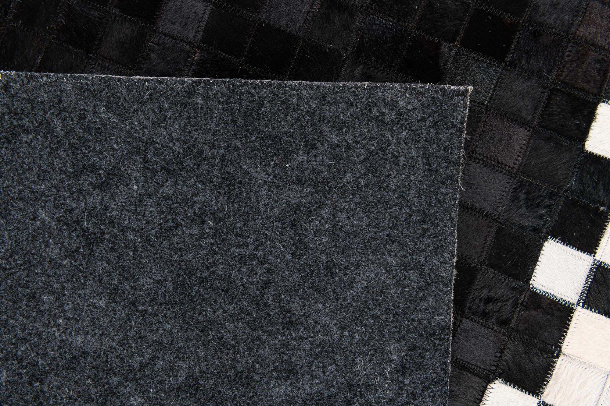 5' x 7' 10 Cowhide Stocks Rug