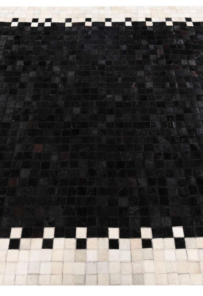 4' 11 x 7' 10 Cowhide Stocks Rug