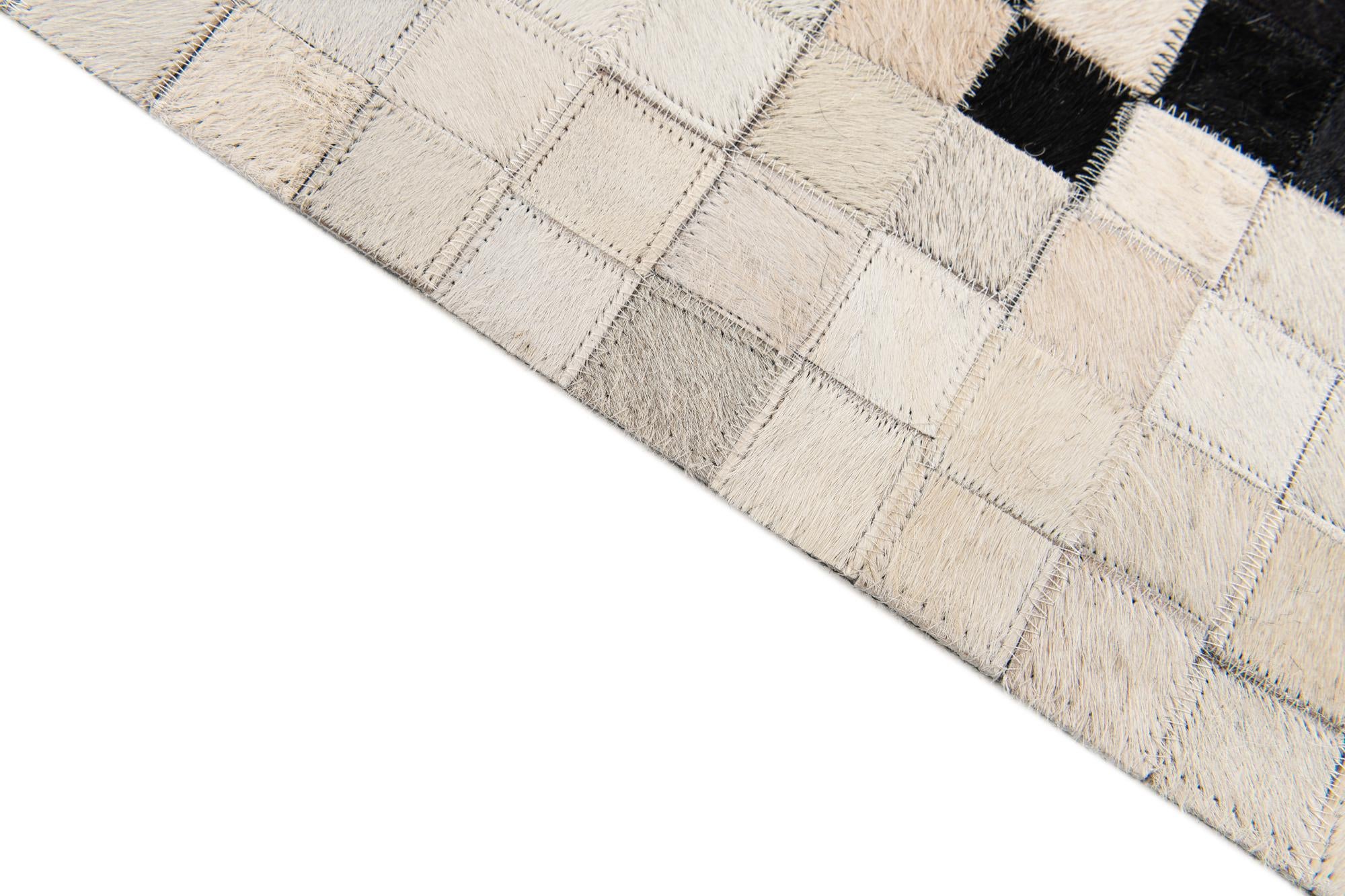 4' 11 x 7' 10 Cowhide Stocks Rug