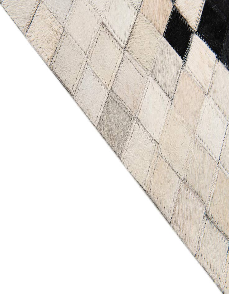 Detail image of 4' 11 x 7' 10 Cowhide Stocks Rug