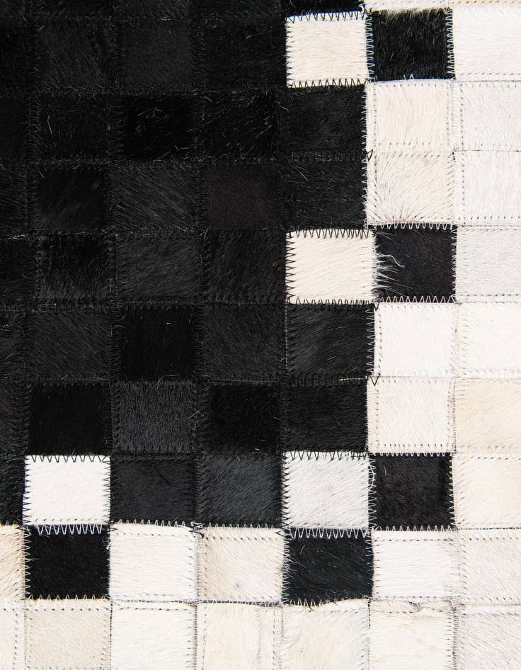 Detail image of 4' 11 x 7' 10 Cowhide Stocks Rug