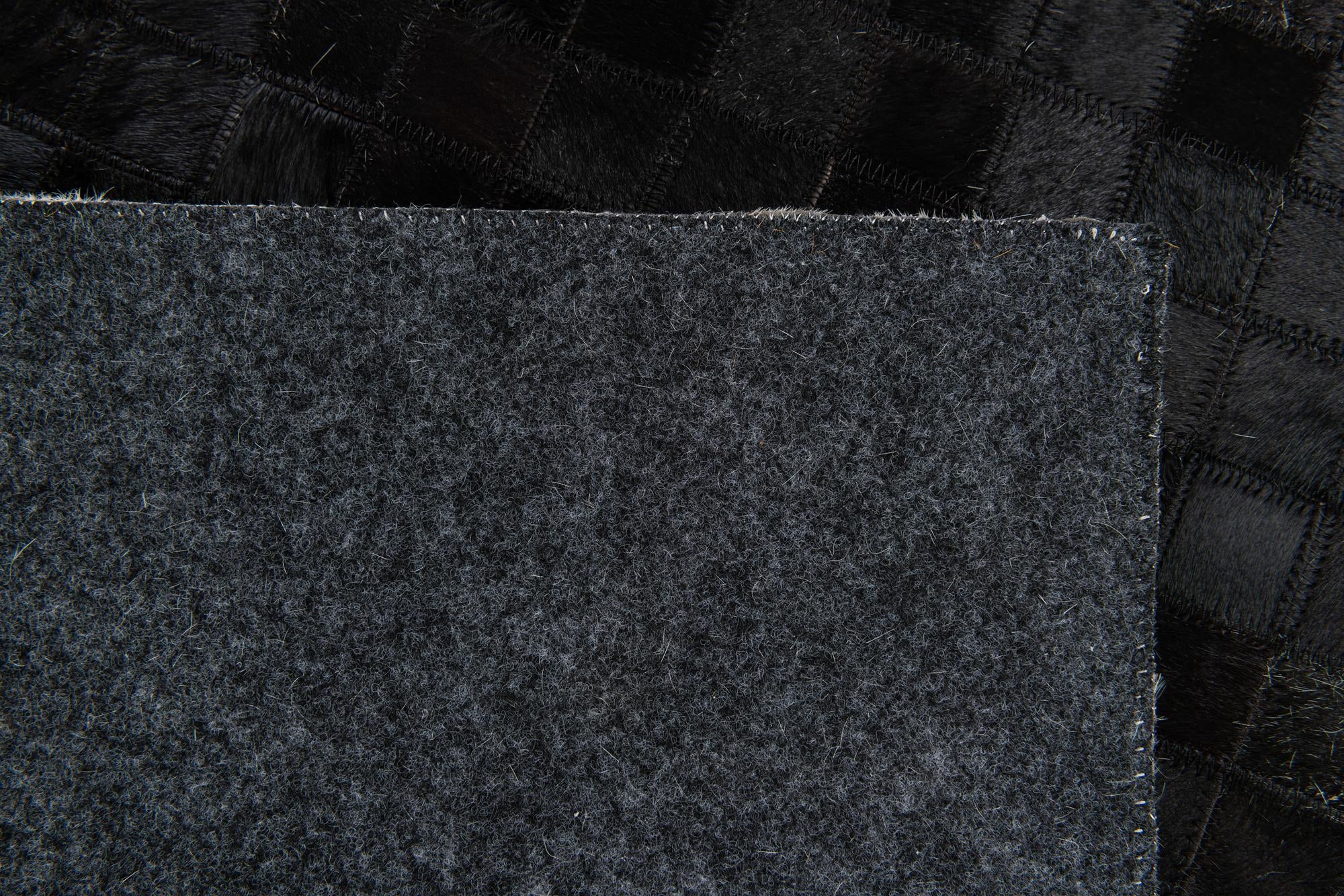 4' 11 x 7' 10 Cowhide Stocks Rug