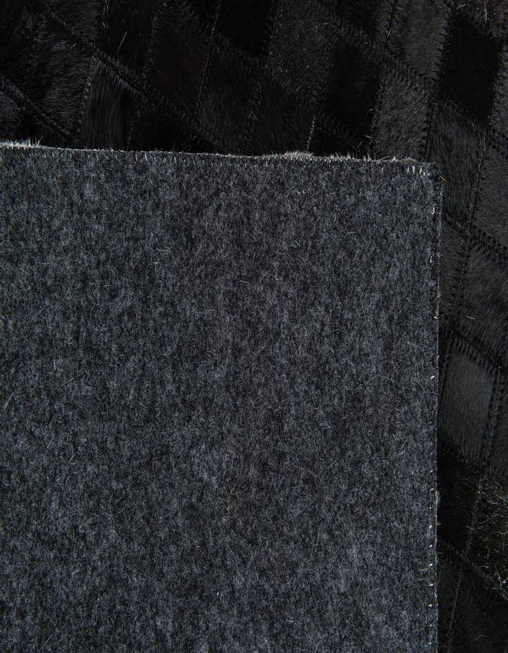 Detail image of 4' 11 x 7' 10 Cowhide Stocks Rug