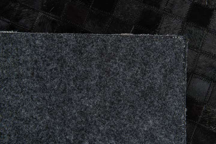 4' 11 x 7' 10 Cowhide Stocks Rug