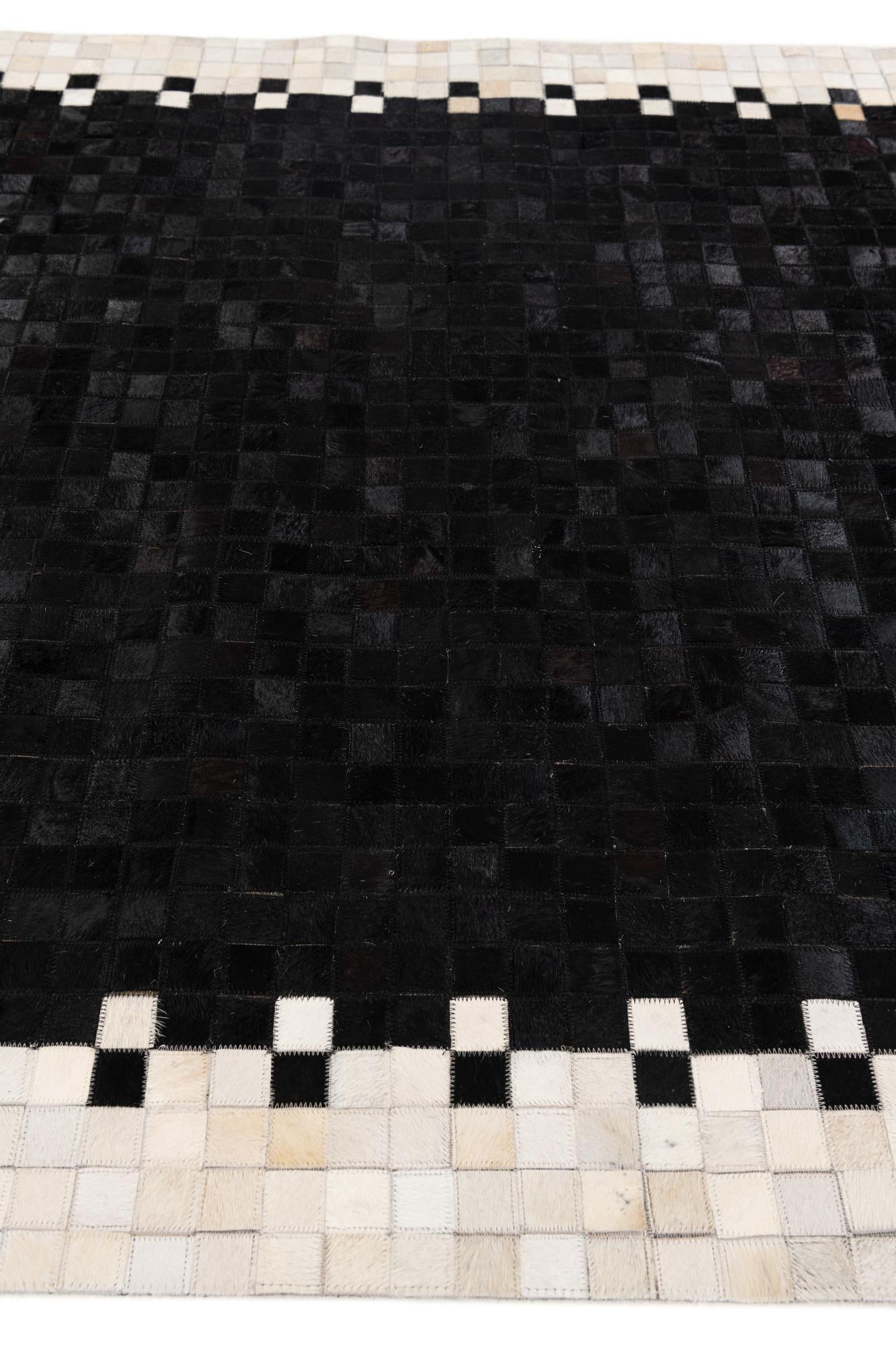 5' 1 x 7' 9 Cowhide Stocks Rug