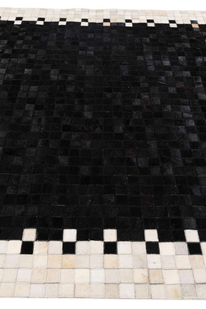 5' 1 x 7' 9 Cowhide Stocks Rug