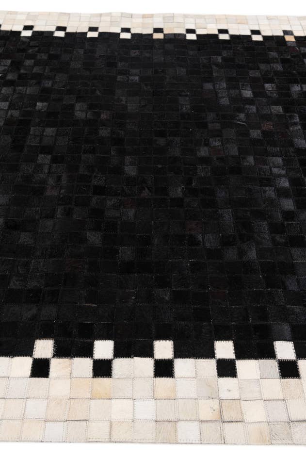 Detail image of 5' 1 x 7' 9 Cowhide Stocks Rug