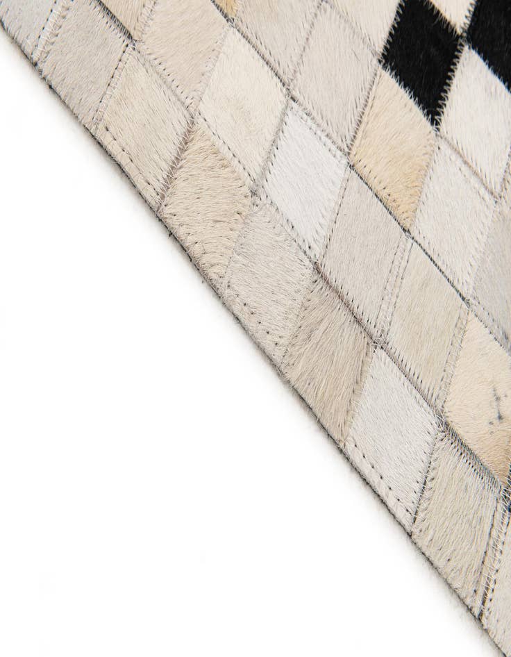 Detail image of 5' 1 x 7' 9 Cowhide Stocks Rug