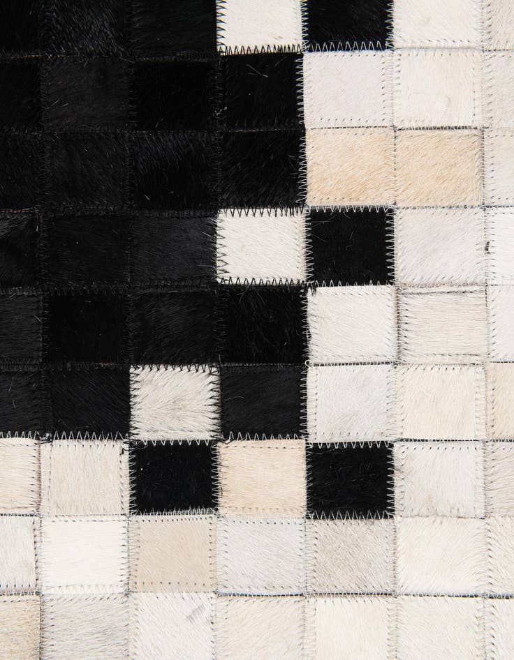 Detail image of 5' 1 x 7' 9 Cowhide Stocks Rug