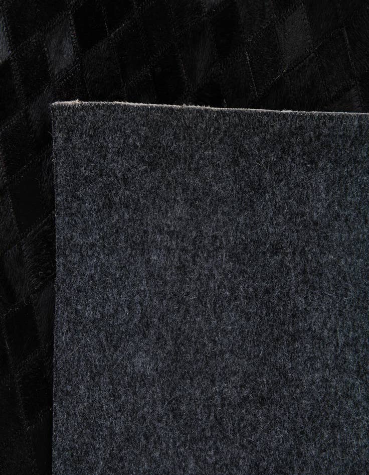 Detail image of 5' 1 x 7' 9 Cowhide Stocks Rug