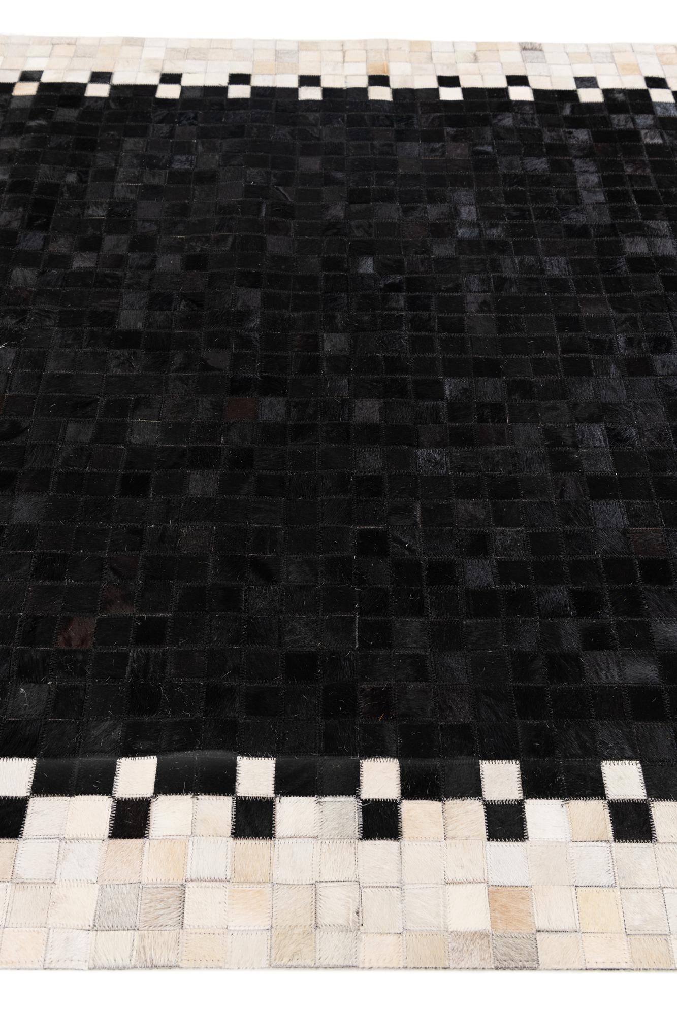 4' 11 x 7' 10 Cowhide Stocks Rug