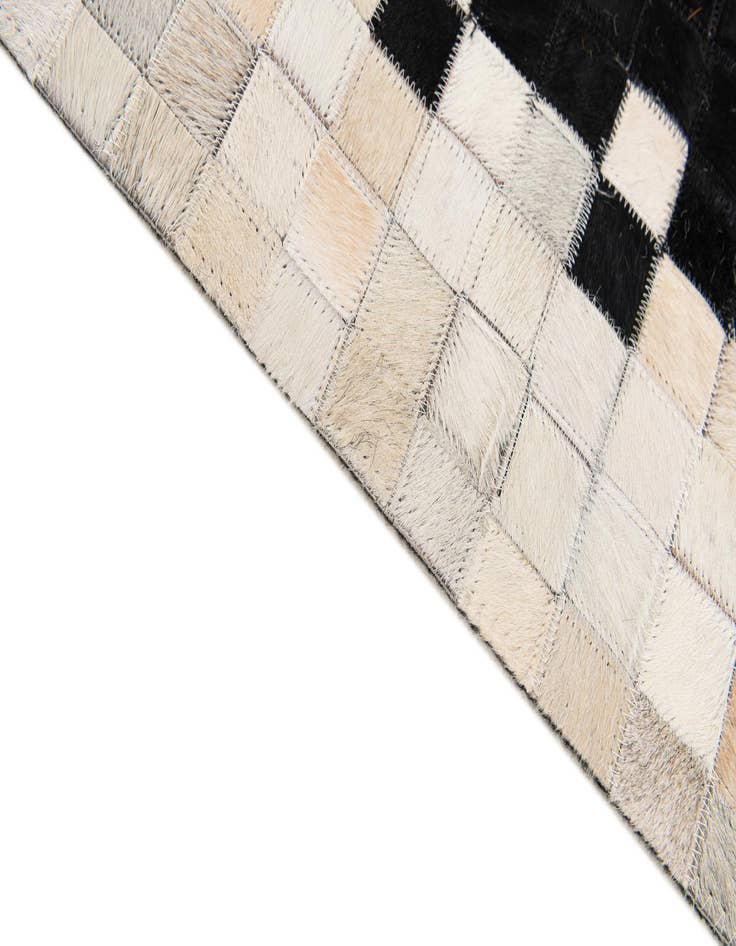 Detail image of 4' 11 x 7' 10 Cowhide Stocks Rug