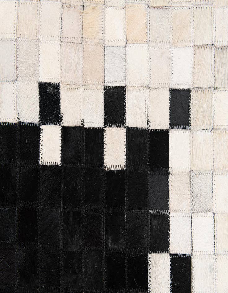Detail image of 4' 11 x 7' 10 Cowhide Stocks Rug