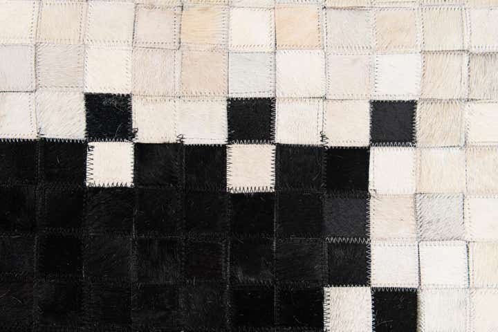 4' 11 x 7' 10 Cowhide Stocks Rug