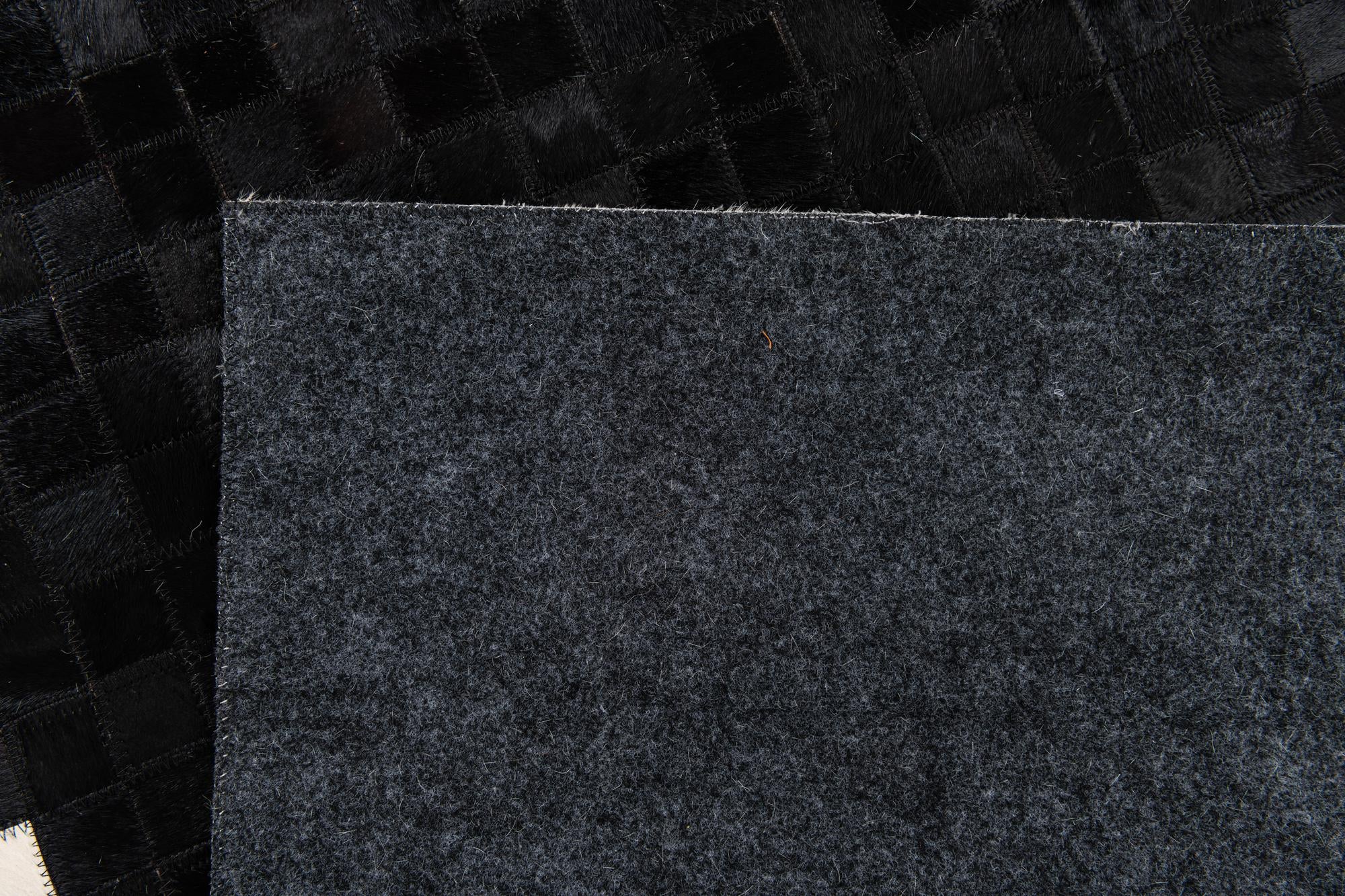 4' 11 x 7' 10 Cowhide Stocks Rug