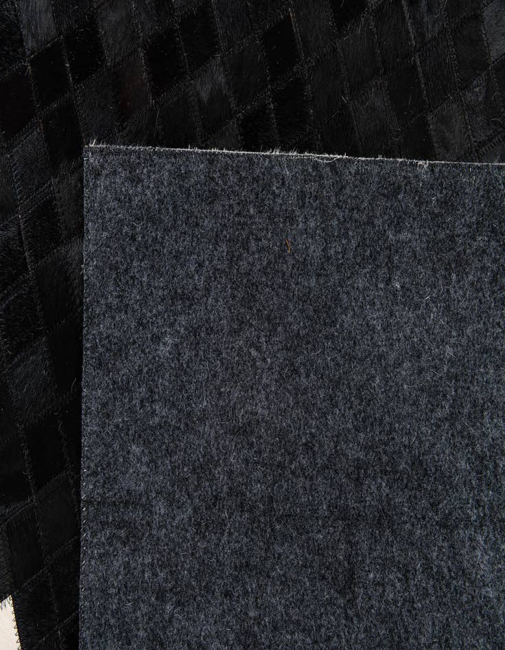 Detail image of 4' 11 x 7' 10 Cowhide Stocks Rug