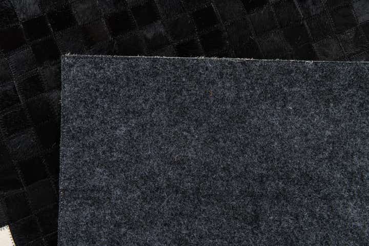 4' 11 x 7' 10 Cowhide Stocks Rug