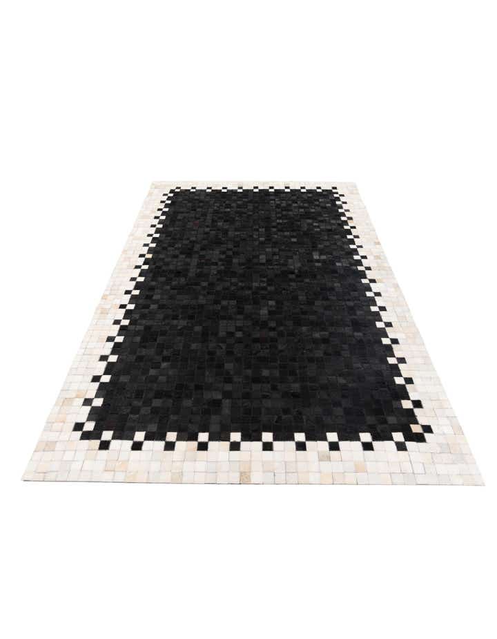 5' 1 x 7' 10 Cowhide Stocks Rug