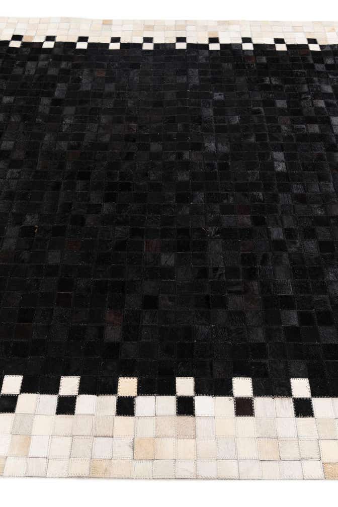5' 1 x 7' 10 Cowhide Stocks Rug