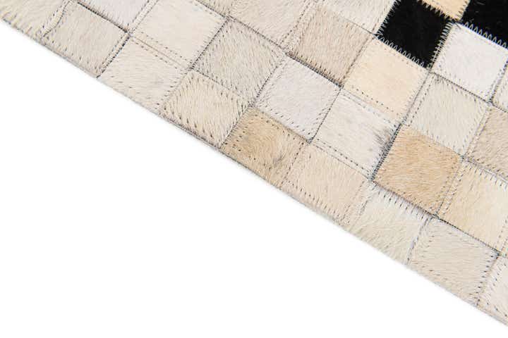 5' 1 x 7' 10 Cowhide Stocks Rug