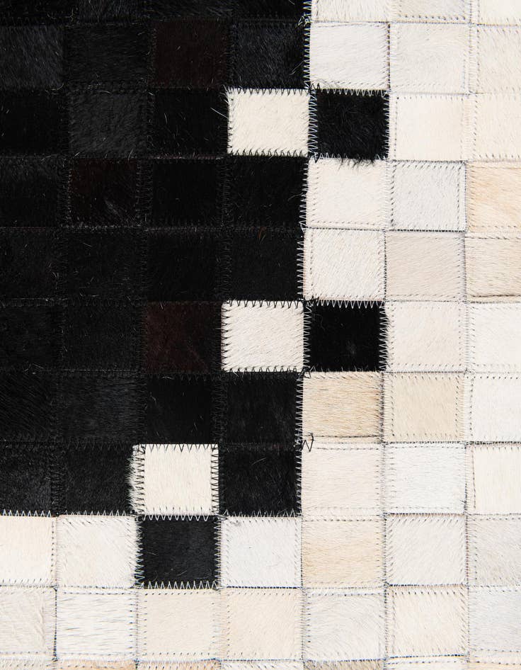 Detail image of 5' 1 x 7' 10 Cowhide Stocks Rug